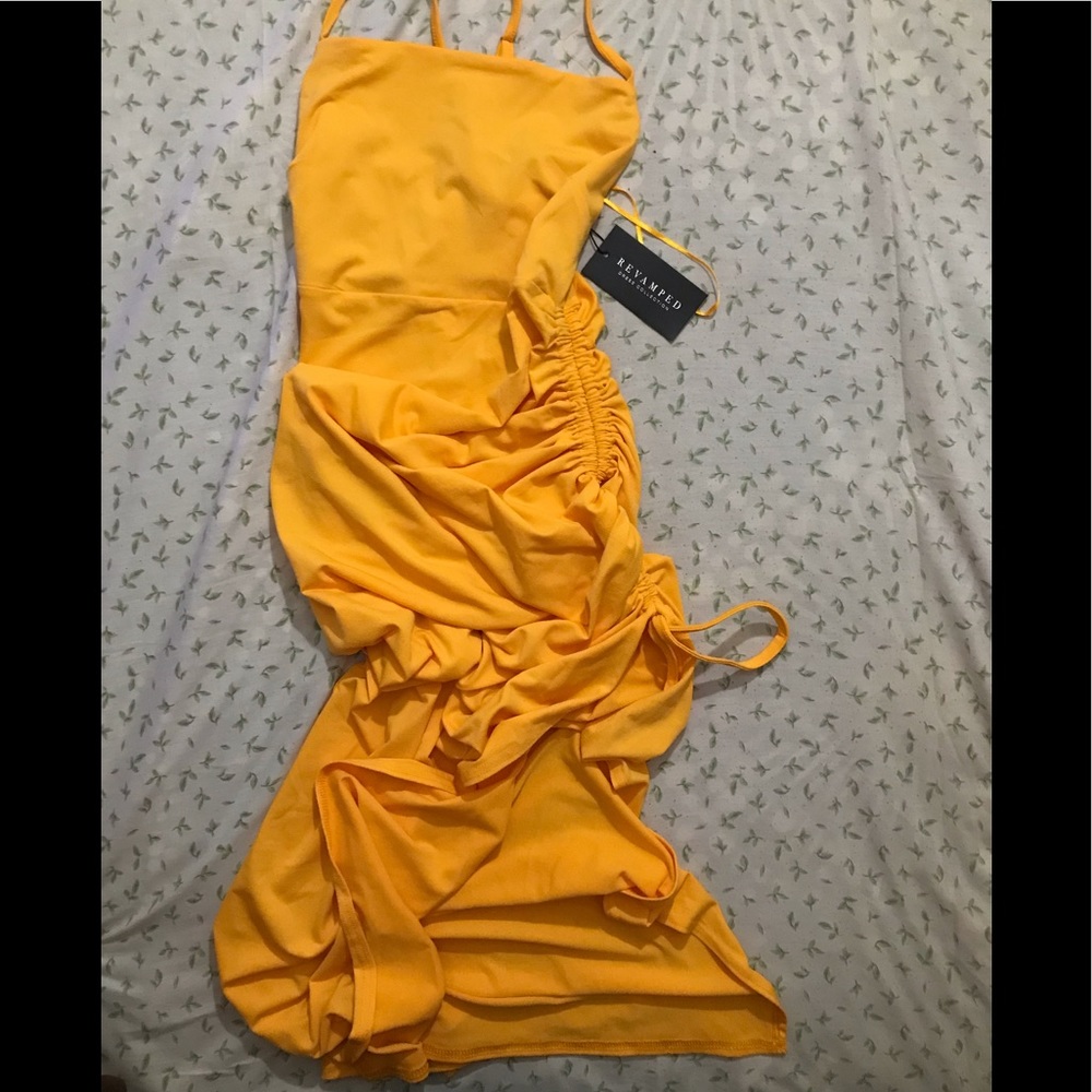 Revamped Dress with beautiful elastic design on side of dress Condition NeW